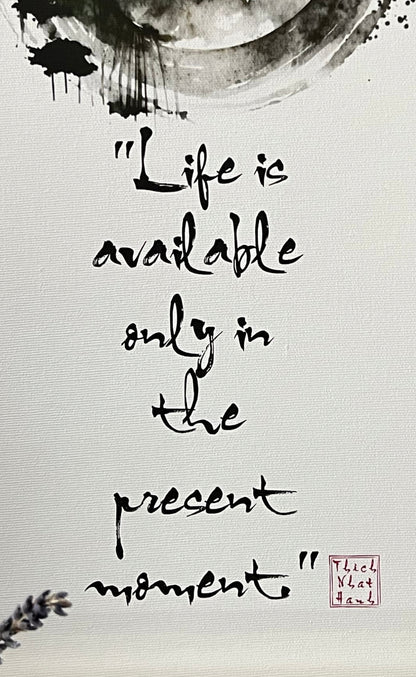 "Life is available only in the present moment." hanging canvas